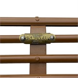 Painted wrought metal 'Arras' chair, curved frame with horizontal rails and scrolled arms, on hoof feet, in russet brown paint finish, with brass plaque 'Usine, S. Sauveur, Arras' 