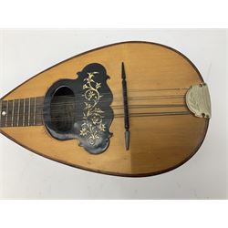 Italian mandolin, with foliate inlaid scratchplate, paper label inscribed 'Carlo Loveri & Figlio of Napoli', L62cm