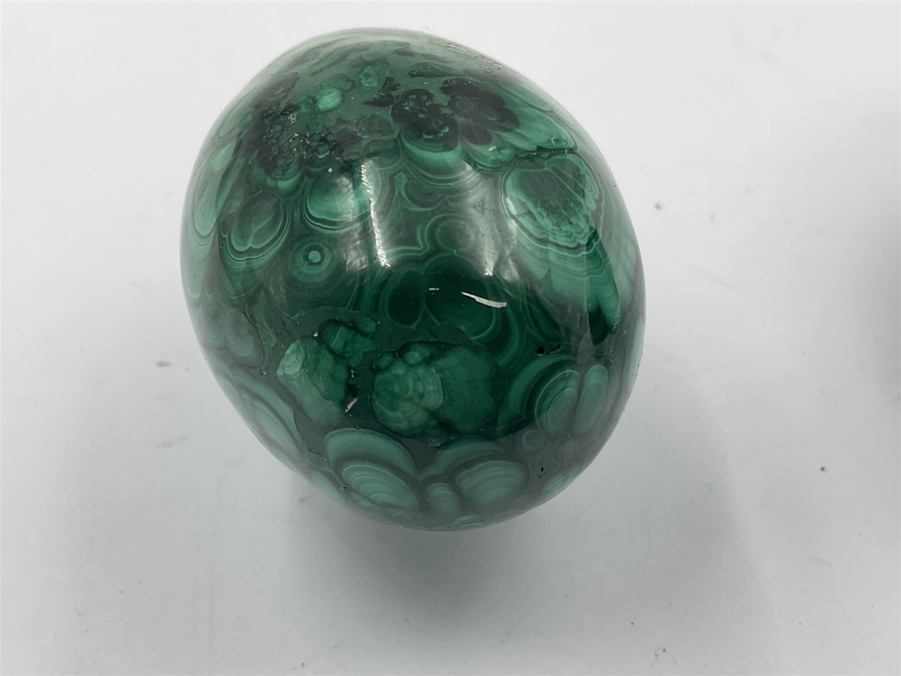 Three malicate specimen eggs, originally part of the collection of the late Stanley J Seeger, largest H7cm