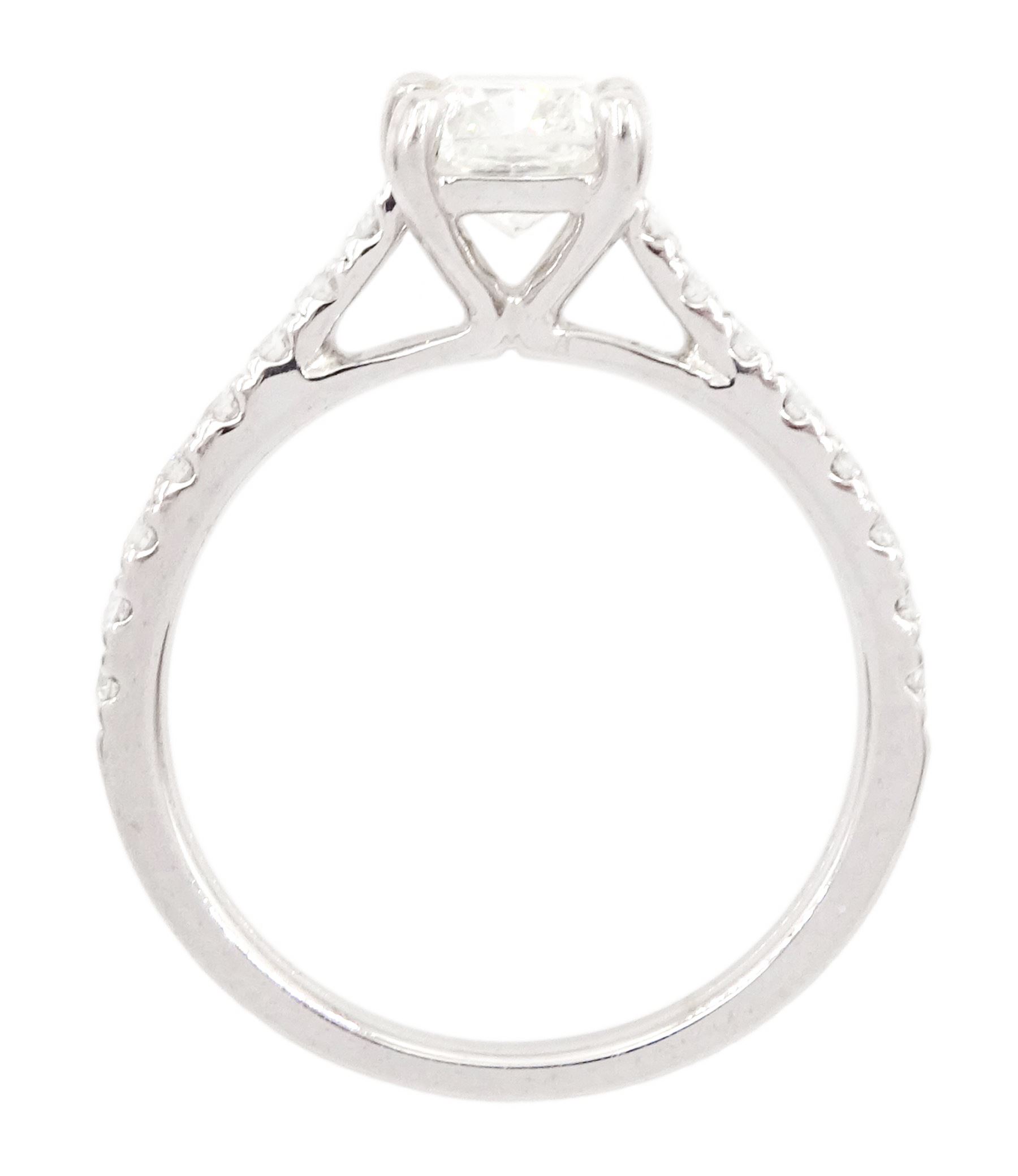18ct white gold diamond ring, set with a single cushion cut diamond of 1.01 carat, with round brilliant cut diamond shoulders, hallmarked, with International Gemological Institute Report