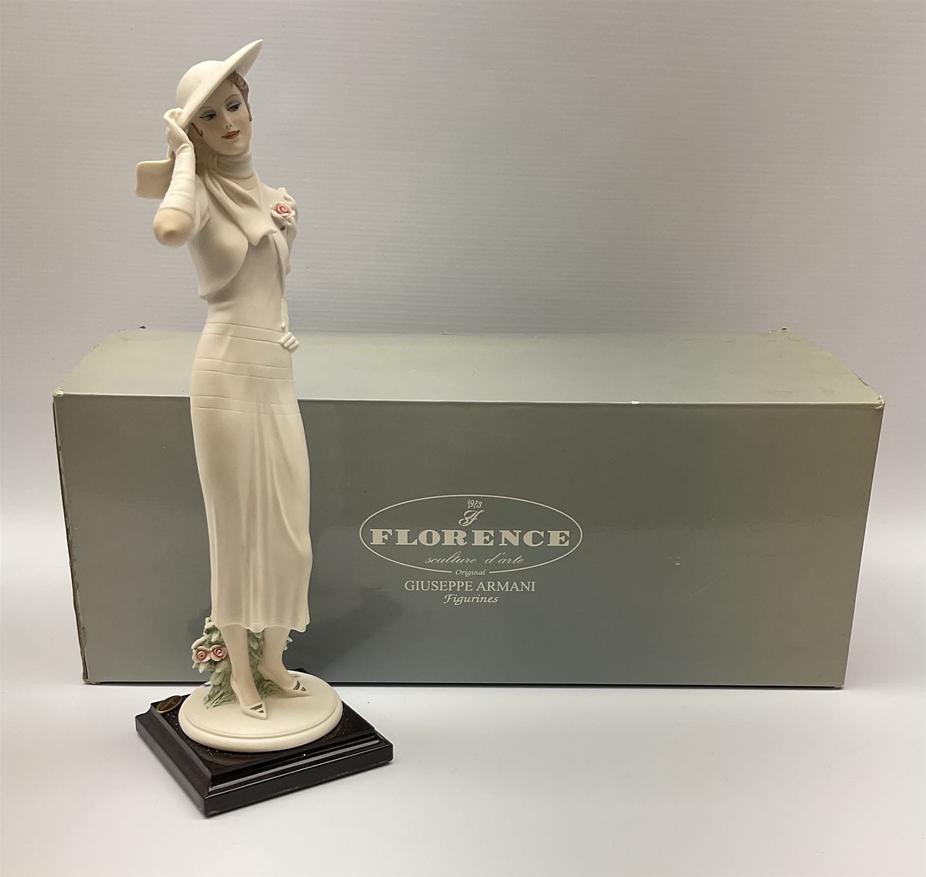 Collection of seven Lladro figures, including Seated ballerina with swan 6204, Childhood Dream 8129, Dancer 5050, reclining clown with ball alongside a selection of other figures. 