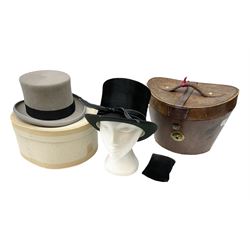 Leather hat box containing black felt top hat with 'British Manufacture' label, together with a grey top hat with 'Allens of Harrogate' label 