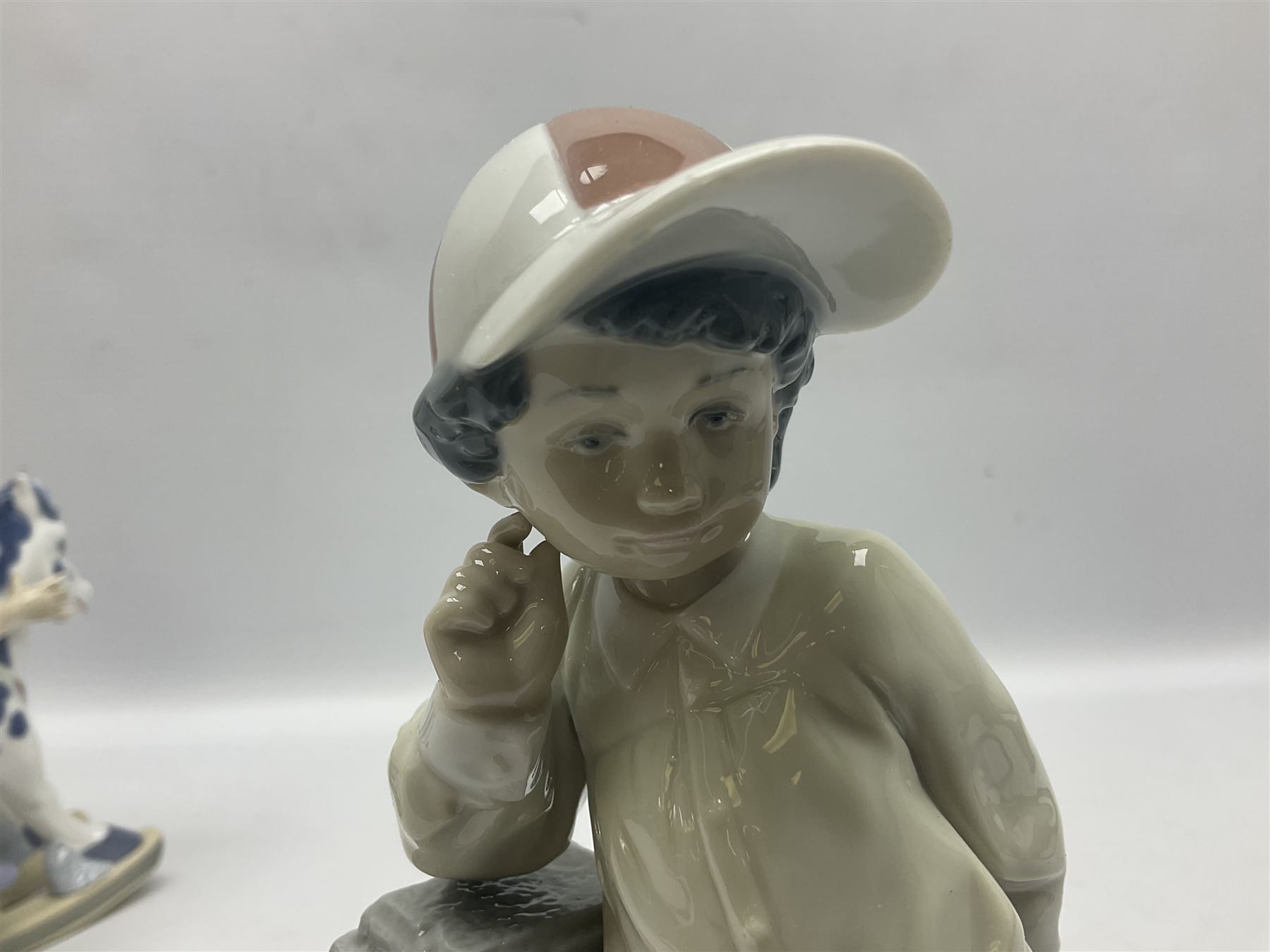 Three Lladro figures, Faithful Steed no 5769, Best Foot Forward no 5738 and Lambkins no 5469, all with original boxes, largest example H21cm 