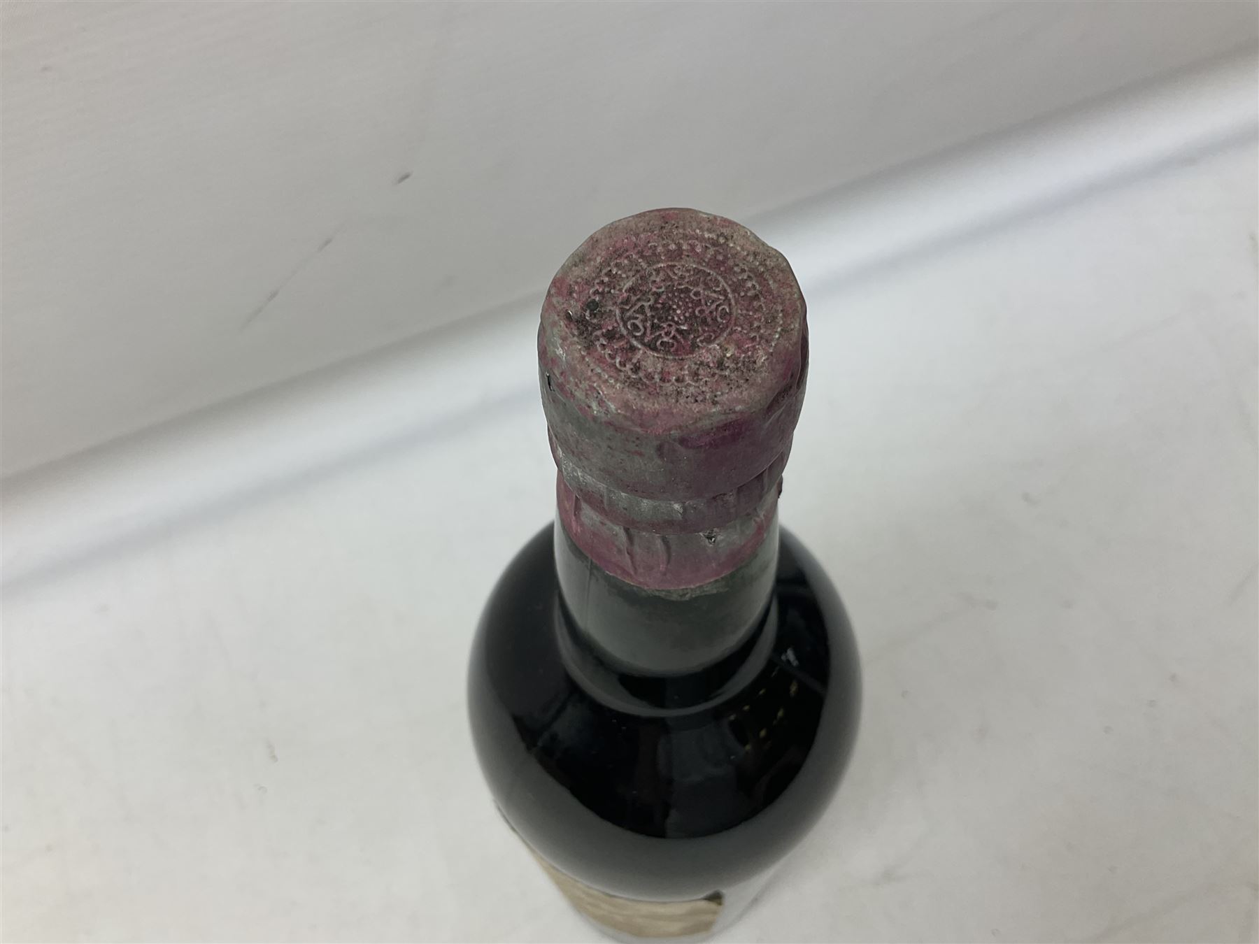 Four bottles of Haig's Dimple Old Blended Scotch whisky, all 26 2/3 Fl.OZs, 70 proof, one in original box and a bottle of East India 1961, Madeira, unknown contents and proof