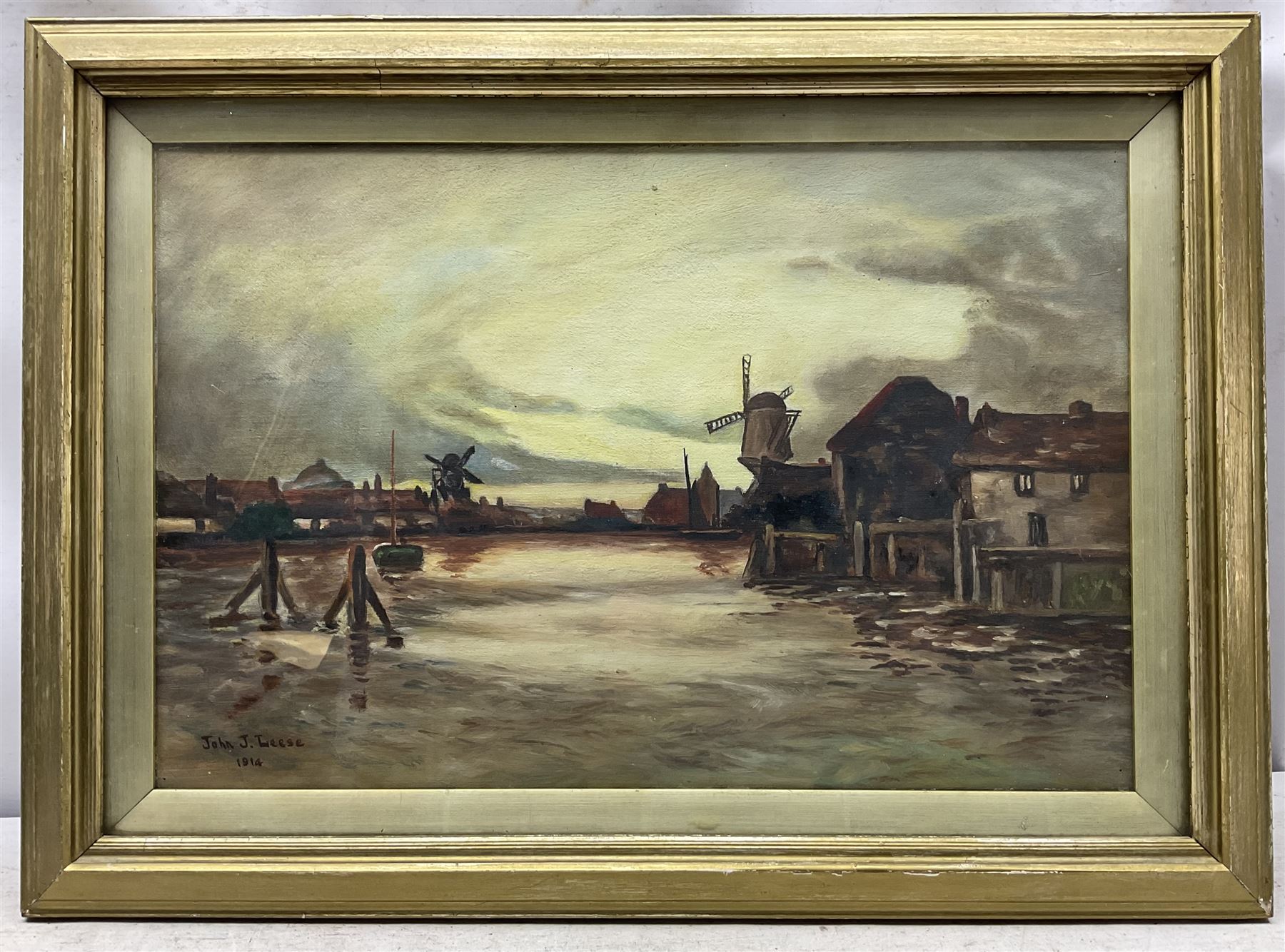 John L Leese (Early 20th century): Dutch Waterway with Windmills, oil on canvas signed and dated 1914, 30cm x 45