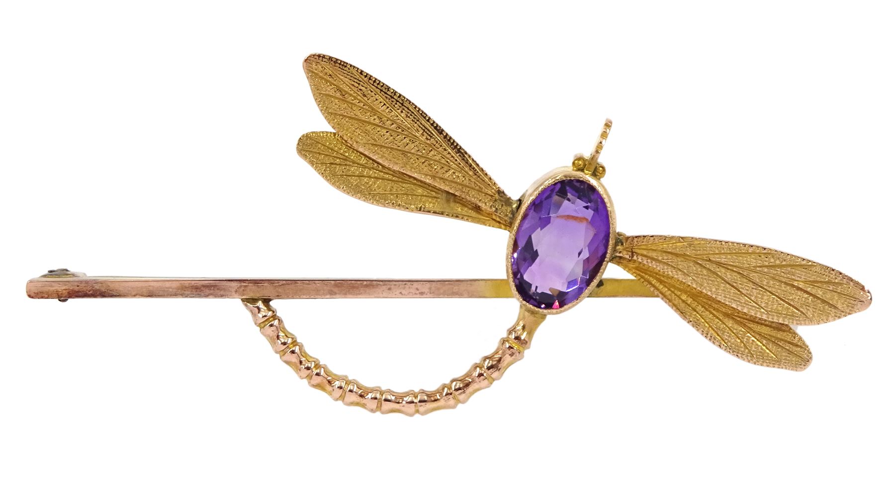 Early 20th century rose gold amethyst dragonfly brooch, stamped 9ct