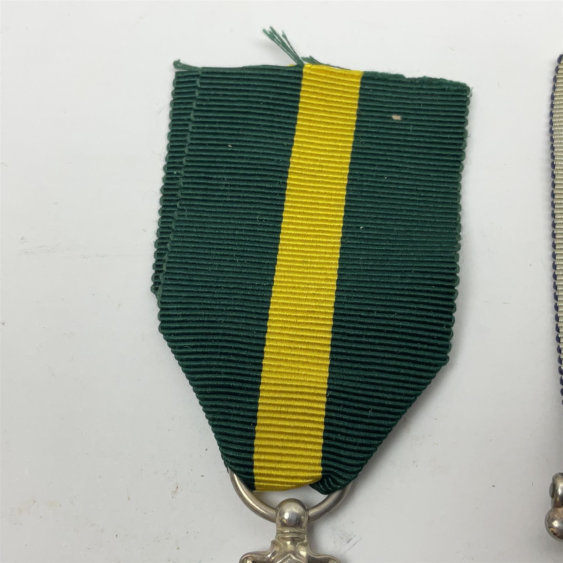 George V Naval Long Service and Good Conduct Medal awarded to K19570 J.L. Honeysett L. Sto. H.M.S. Royal Oak; and George V Territorial Force Efficiency Medal awarded to 312762 Ftr. S/Sjt. D. Newton R.G.A.; both with ribbons (2)