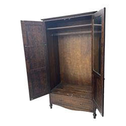Marks & Spencer - dark wood double wardrobe, fitted with single drawer, on turned feet