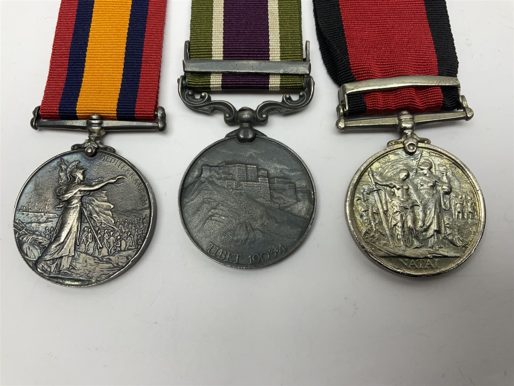 Seven copies of early medals - Waterloo, Crimea, Mediterranean, China 1900, Victoria Cross, Natal Rebellion and Tibet 1903-4; all with ribbons (7)