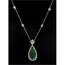 18ct white and yellow gold emerald and diamond necklace, the pear shaped emerald of 9.58 carat, with round brilliant cut diamond surround and bail and four diamonds set within the chain, stamped 750, with World Gemological Institute Report