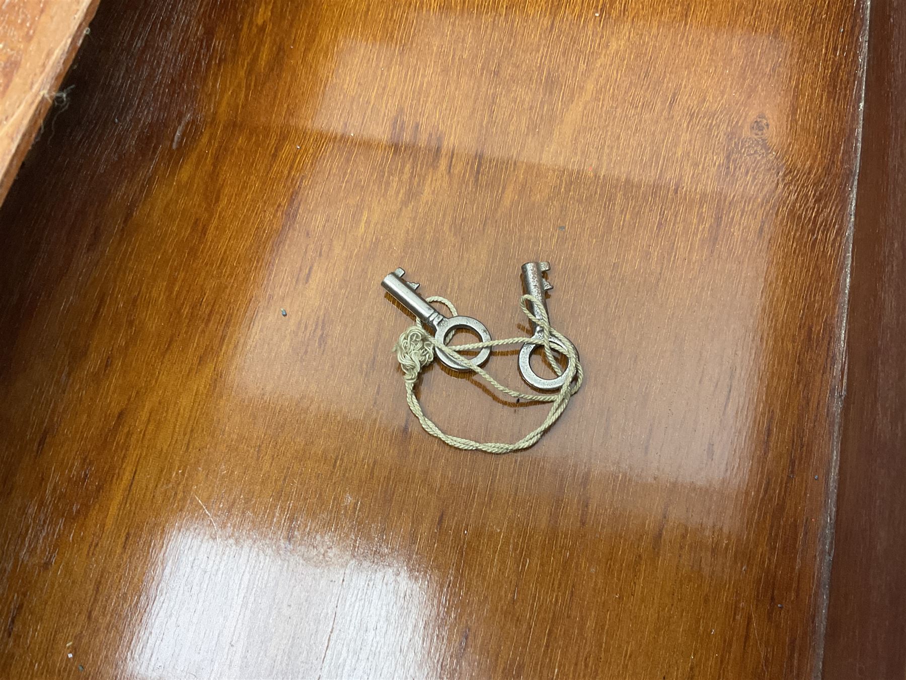 Victorian mahogany writing slope, the brass bound hinged cover opening to reveal tooled leather and gilt interior with two glass inkwells, together with a similar parquetry inlaid writing slope, with central mother of pearl inlay enrgraved 'Sarah', tallest H17cm 