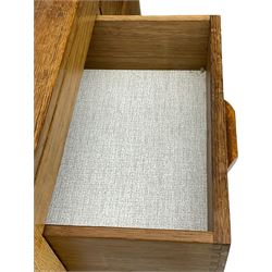 Yorkshire Oak - oak chest, fitted with two short over three long drawers, on octagonal feet with castors 