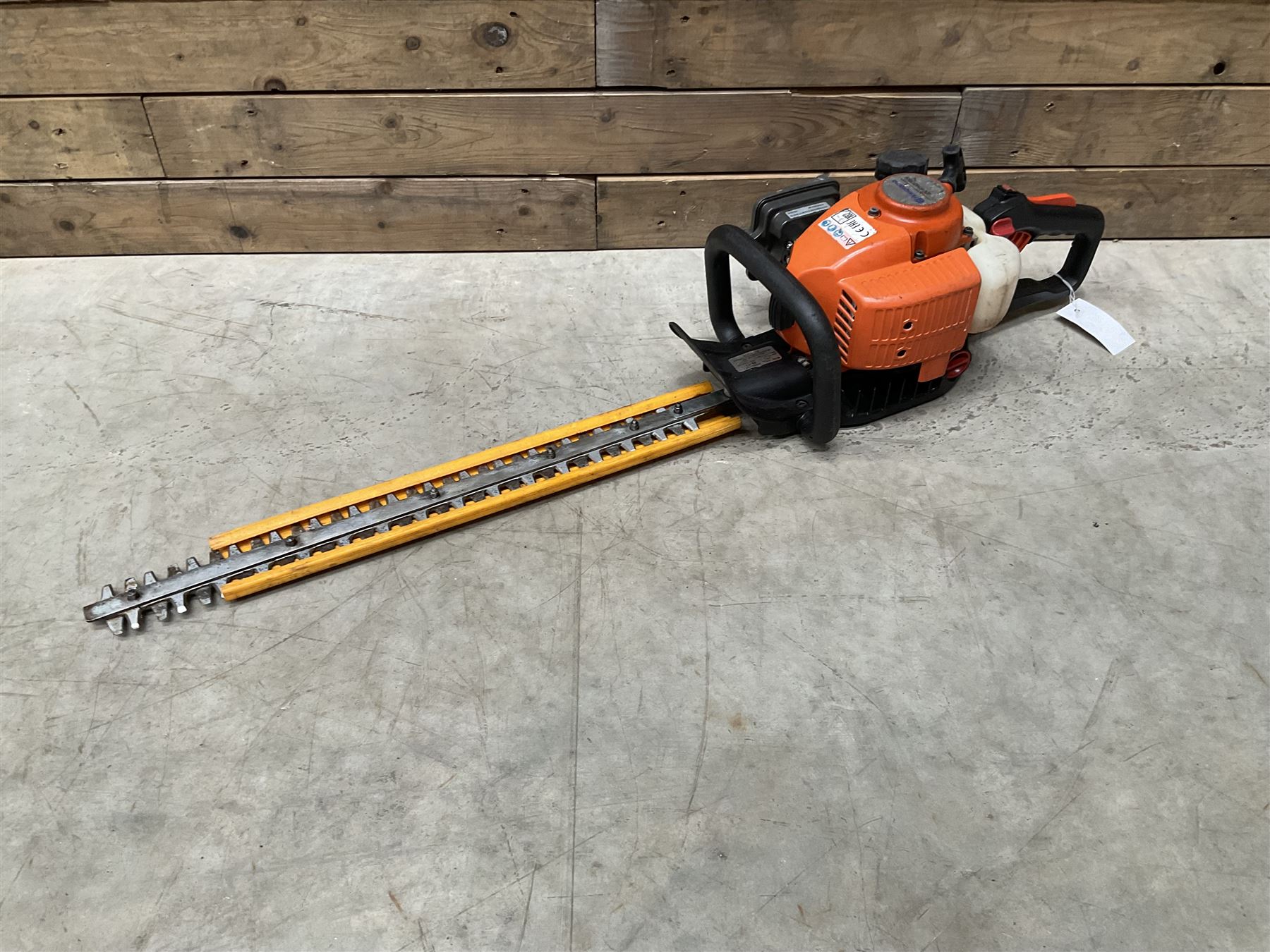 Husqvarna 141 petrol chainsaw and a Husqvarna 226HD75S petrol hedge cutter