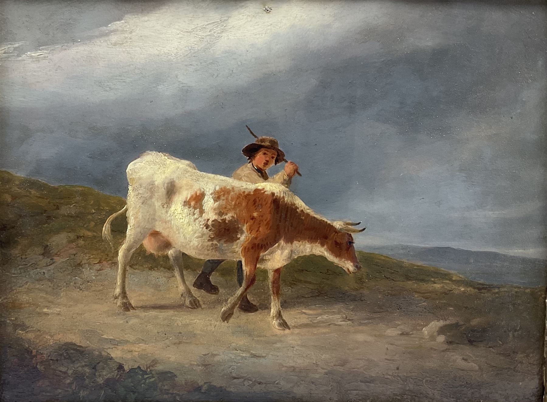 English School (18th/19th century): Farm Boy leading a Cow on a Moorland Track, oil on oak panel unsigned 21cm x 27cm