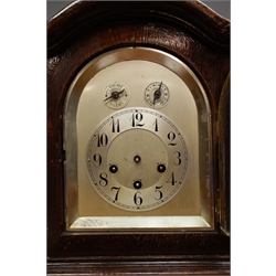  Early 20th century oak cased mantel clock, silvered dial with Arabic chapter ring, with chime/silent and slow/fast levers, 'Junghans' triple train movement, H36cm  