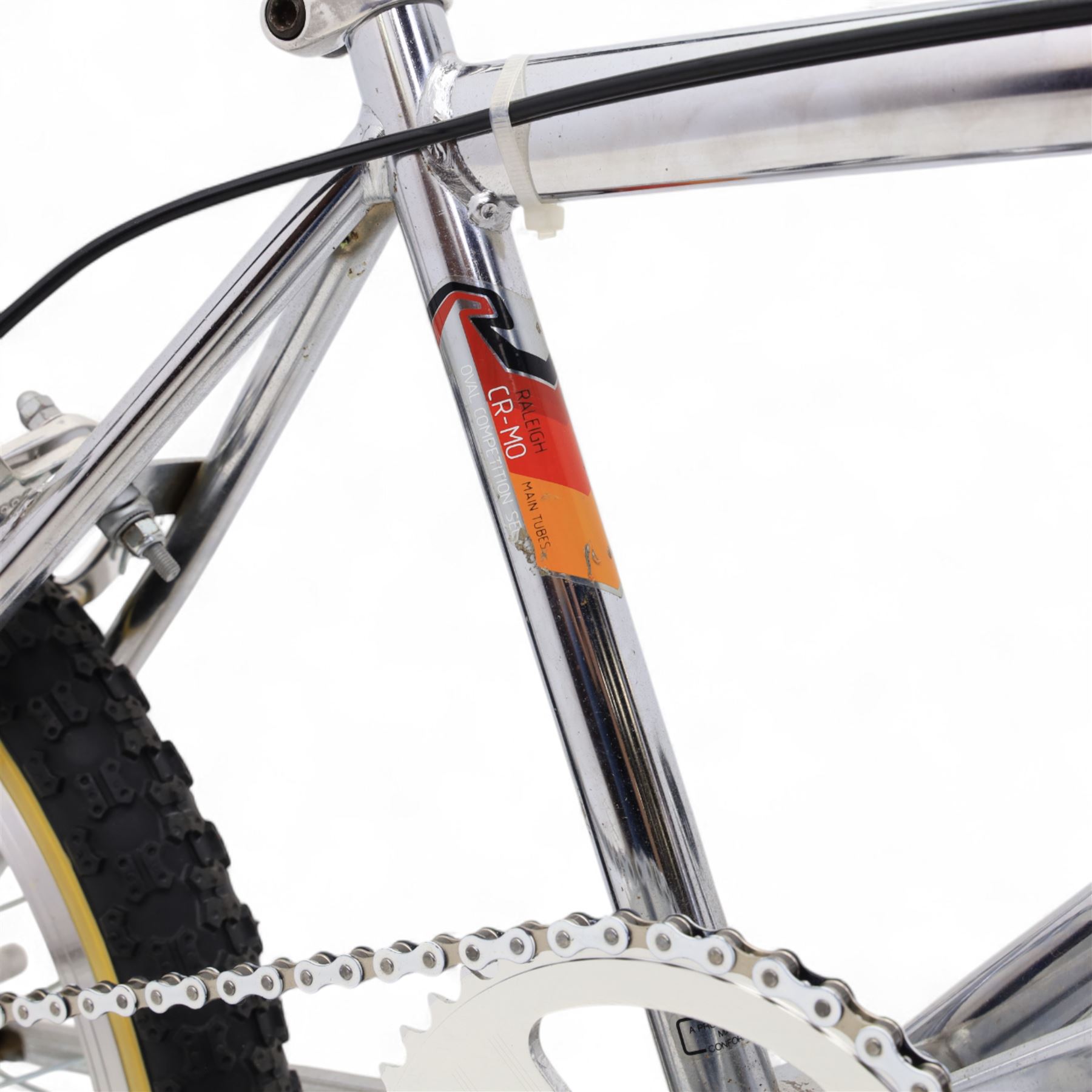 1980s Raleigh Cromo Burner BMX bike, with some original and some upgraded parts, including Oval Competition section frame and fork, Tange black rubber grips, Redline chain wheel, DMR Bikes V6 pedals and Duro Nylon F-075 tyres