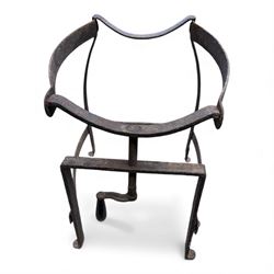 Cast stone female figure along with vintage iron pot-cradle / cauldron stand 