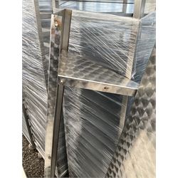 Three tier stainless steel shelving rack, and three stainless sleeves - THIS LOT IS TO BE COLLECTED BY APPOINTMENT FROM DUGGLEBY STORAGE, GREAT HILL, EASTFIELD, SCARBOROUGH, YO11 3TX