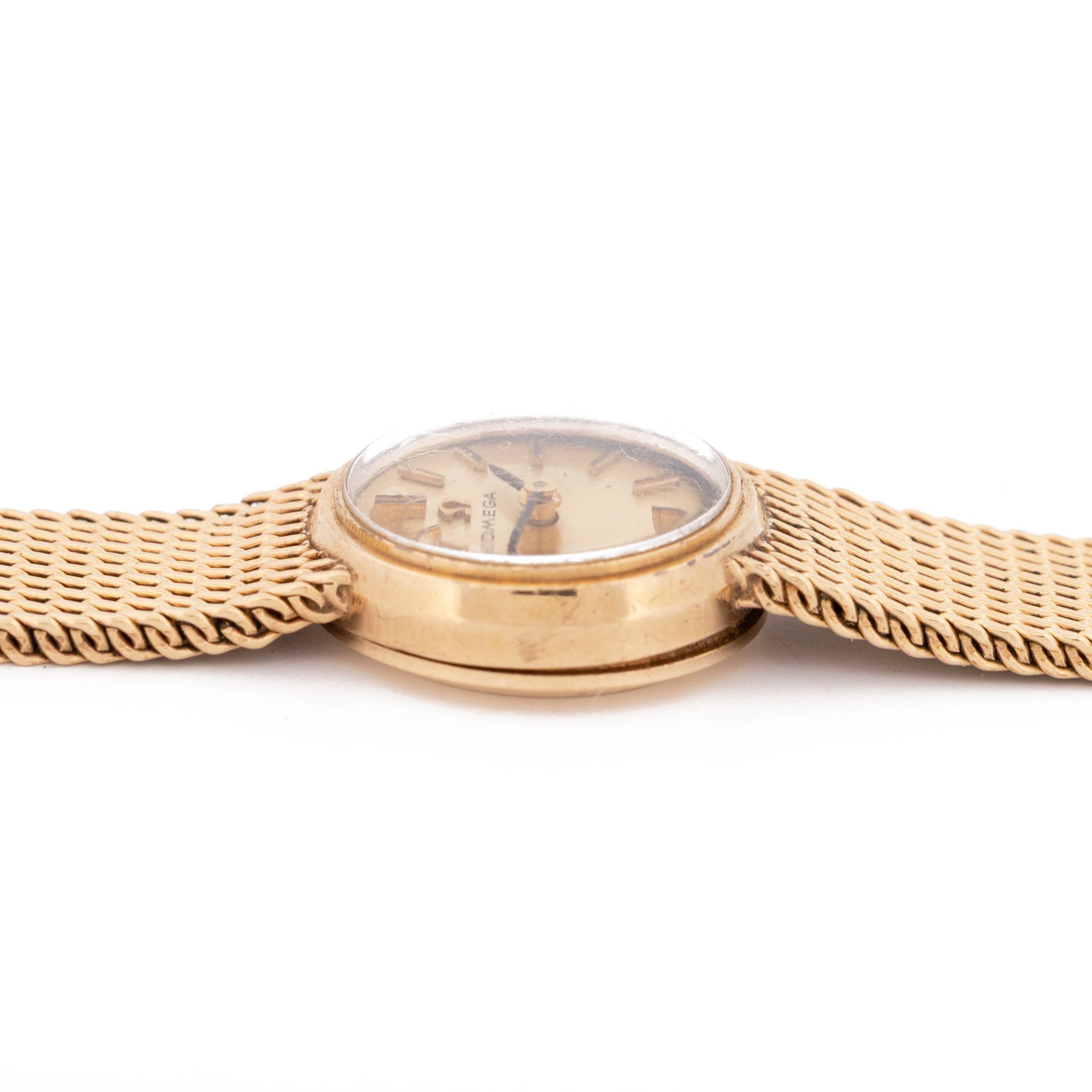 Omega ladies 9ct gold manual wind wristwatch, Cal. 244, white / cream dial with dagger and Arabic hour markers, case by Dennison, Birmingham 1958