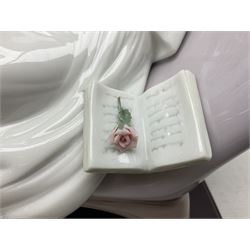 Lladro figure, Garden of Dreams, modelled as a woman reclining in front of trellis of flowers on a mahogany base, limited edition 3129/4000, sculpted by  José Puche, with original box, no 7634, year issued 1994, year retired 1996, H32cm