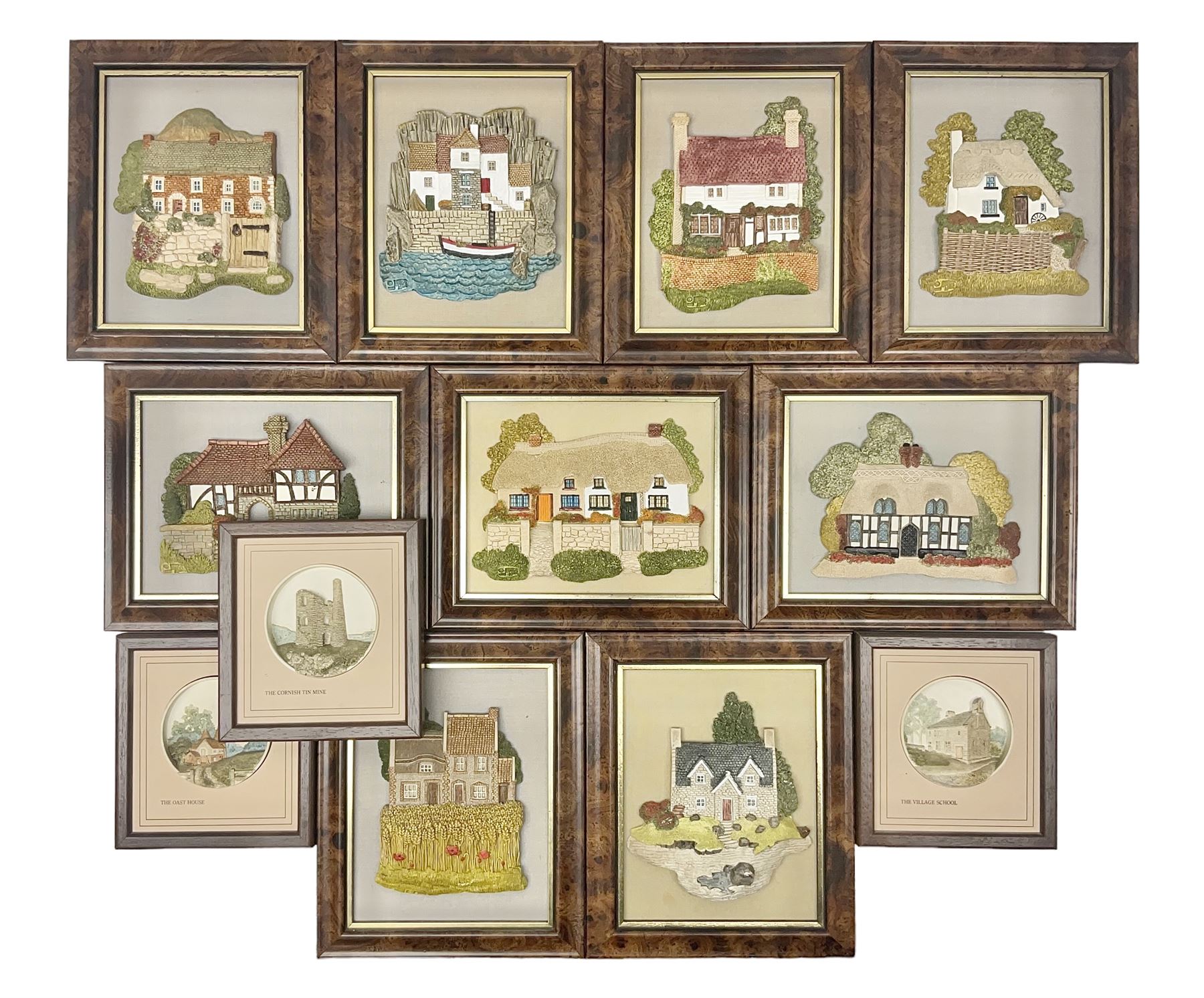 Nine Lilliput Lane framed wall plaques, including Fell View, Battleview, Catslide Cottage, Ashdown Hall and Shannon's Bank, together with three smaller circular framed Lilliput Lane plaques