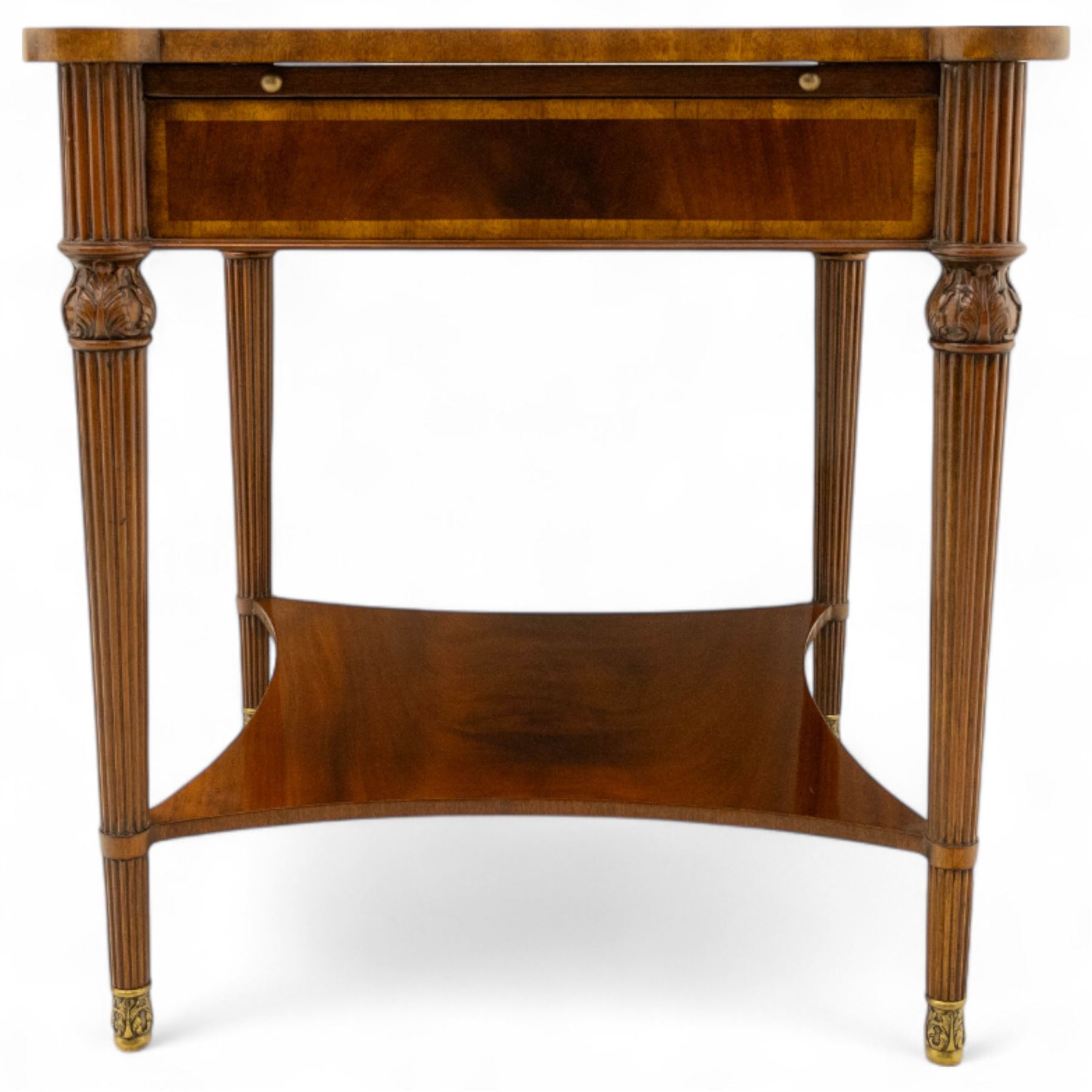 Maitland Smith - Pair of mahogany side tables, the rectangular top with rounded corners, the top edge inlaid with movingui wood, above two under-tier shelves, and frieze drawer, supported on stop-reed and acanthus foliate carved legs united by platform stretcher, raised on brass sabot foot caps