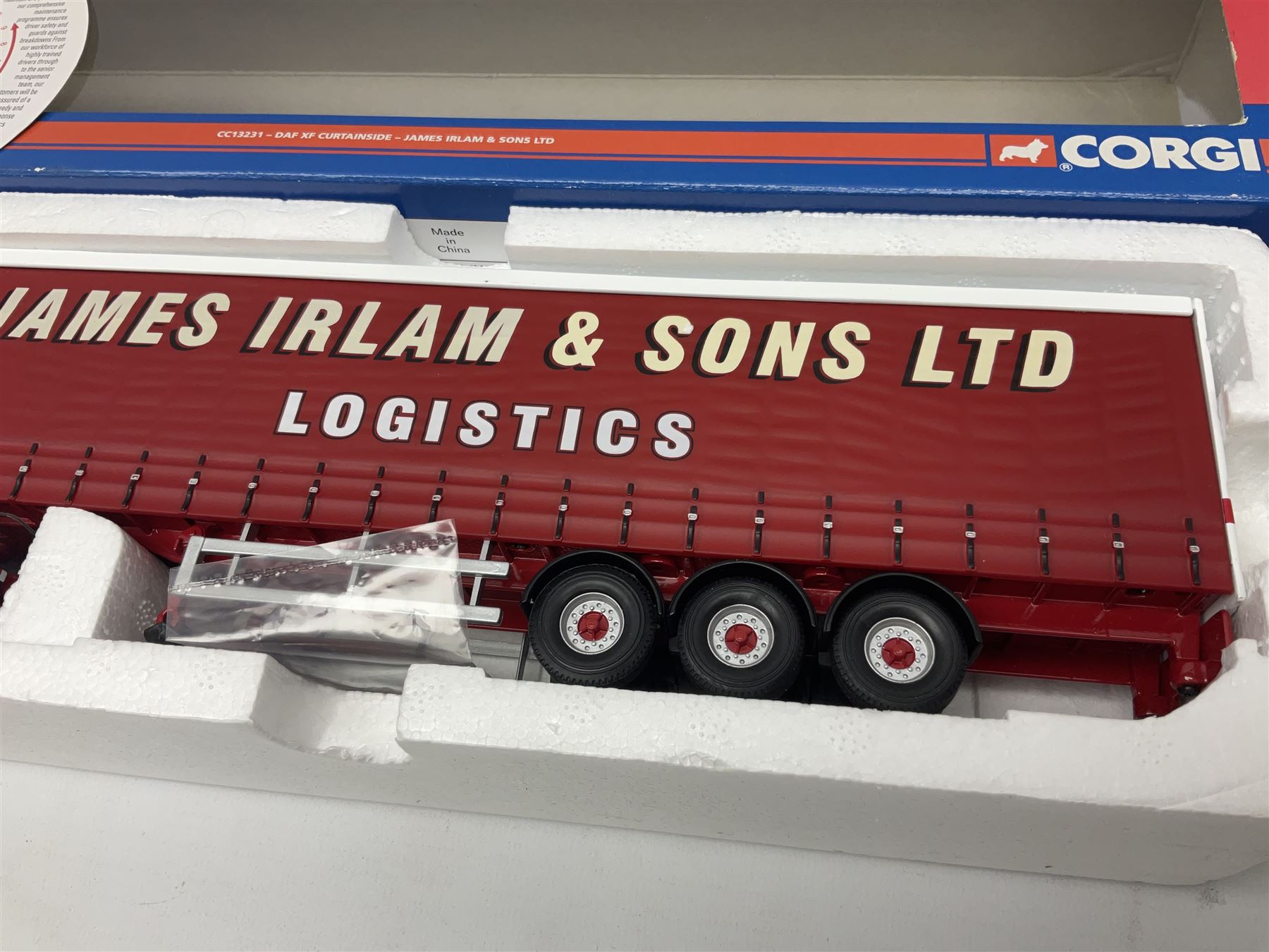Corgi - three limited edition Hauliers of Renown lorries; CC13231 DAF XF Curtainside James Irlam & Sons Ltd; CC13420 MAN TGA Curtainside Woody's Express; and CC13603 DAF CF Curtainside Tyson H. H. Burridge Ltd; all boxed (3)