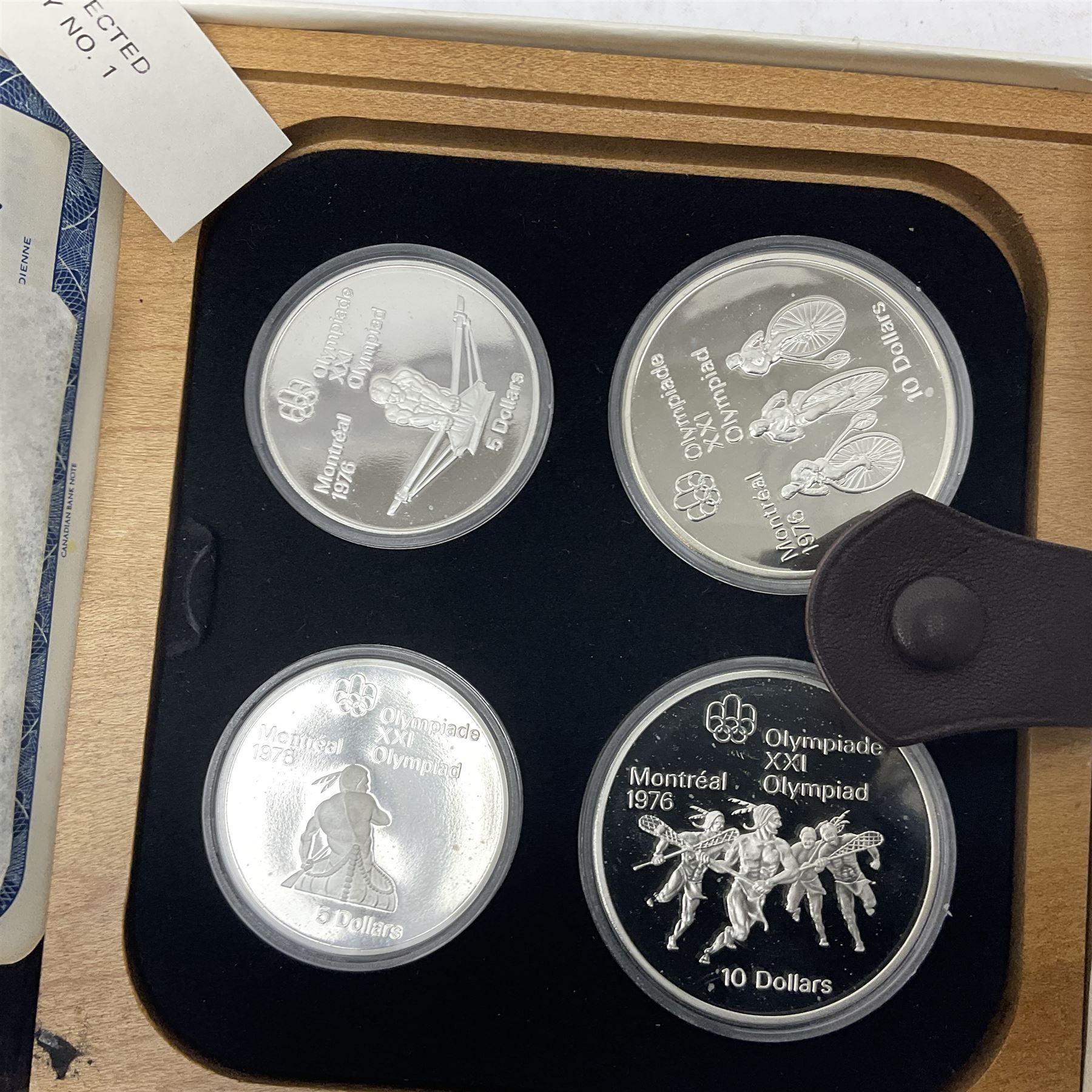 Six Queen Elizabeth II The Royal Canadian Mint silver proof four coin sets, to commemorate the 1976 Montreal Olympic Games, each set containing two five dollar coins and two ten dollar coin with Queen's head obverse and designs to the reverse relating to the Olympic Games, all in the original display cases and outer card boxes with certificates