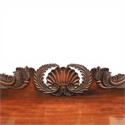 Mid Victorian mahogany pedestal sideboard, the rectangular top with raised back centred by a carved shell within scrolling acanthus and foliate cresting, over a central shaped frieze drawer flanked by two short drawers, above a kneehole recess, flanked by panelled cupboard doors with carved corbel supports, enclosing shelved interiors