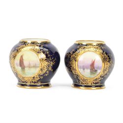 Pair of small Coalport vases, the panels painted with shipping scenes, with a cobalt blue ...