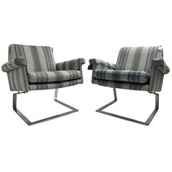  Pair of mid-20th century cantilever armchairs, upholstered in striped blue and silver fabric, raised on a chrome base