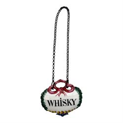 Seventeen mid 18th century and later enamel wine labels, one example of heart shaped form, the rest of cartouche and escutcheon form, various titles including Claret, Rum, Sloe Gin, Port, Whisky, Cowslip, Cherry-Brandy, etc., largest example W7cm 