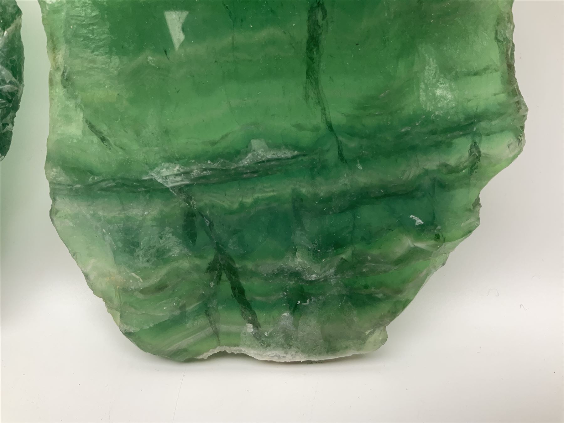 Pair of green fluorite slices, polished with rough edges, H16cm, L17cm  