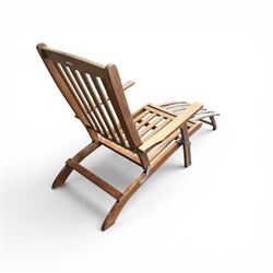 Pair of teak folding steamer chairs, with slatted backs, seats and extending footrests, adjustable recline.