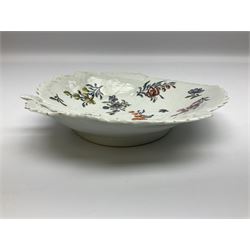 Mid 18th century Worcester fig leaf shape dish, circa 1756-1758, moulded as a single leaf with veining, serrated rim, and stalk, painted in polychrome enamels with floral spray, sprigs, and insect in the Meissen style, L20cm

This fig leaf shape is considered rare having only been in production for a short time.
Due to the crispness and detail in the veining it is believed that 'the mould was produced by taking a cast from an actual leaf'
This shape was made in two sizes, the larger examples such as this can be found decorated in the Chinese style in blue and white, or in the Meissen style in enamels.

Cf. Lot 27, Zorensky collection part 1, 16 March 2004, Bonhams
Lot 326, Zorensky collection part 1, 16 March 2004, Bonhams




