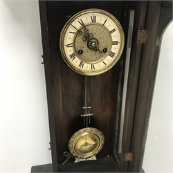 Late 19th century Vienna style wall clock, walnut and beech cased, turned half columns, twin train movement striking on coil, H68cm (with pendulum)