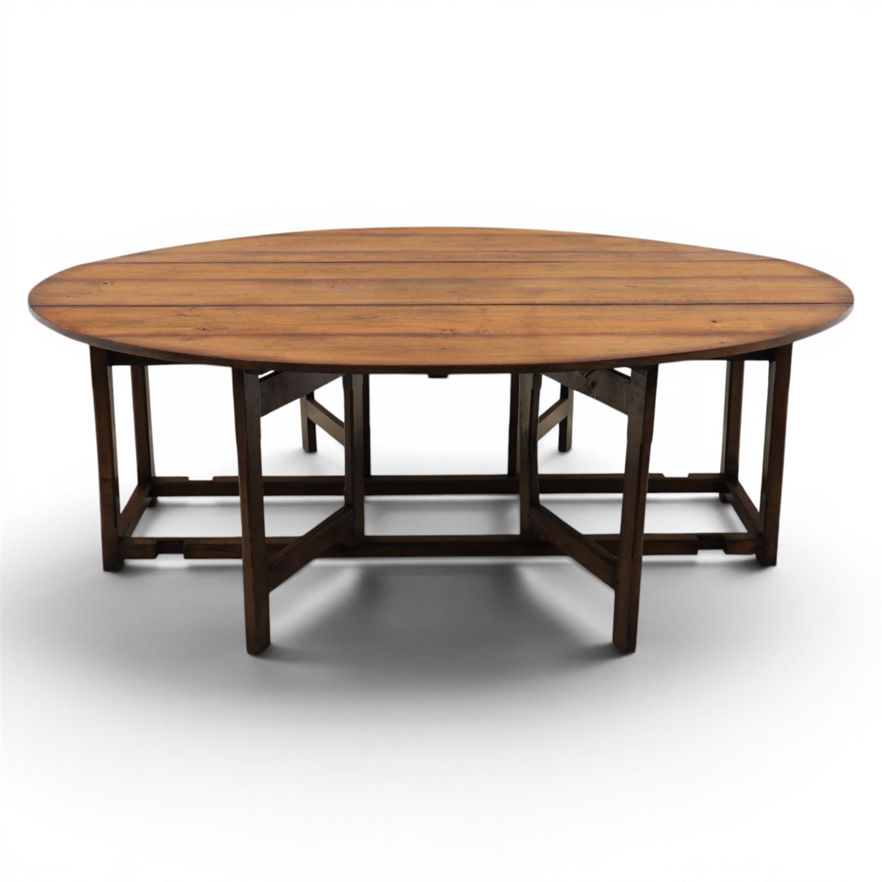 Large 18th century style oak wake table, with drop leaves and gateleg action on turned supports extends to 178 cm 