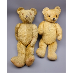  Mid-20th century plush covered teddy bear with applied eyes, stitched nose and mouth, straw-filled body with growler mechanism and jointed limbs H68cm and another similar with revolving head (2)  