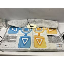 Nintendo Wii console, four controllers with cases and four nunchucks, Wii sensor bar, balance board and dance mat. Guitar hero wireless guitar for Wii and Redoctane wired guitar. Nintendo DS lite handheld gaming console, console and game cases and Guitar Hero Redoctane Guitar Grip. Selection of Nintendo Wii and Nintendo DS lite games to include Super Mario Galaxy, Guitar Hero, Wii Fit, Legend of Zelda games etc. Archos AV400 Series pocket video recorder with accessories, cradle and remote, in three boxes