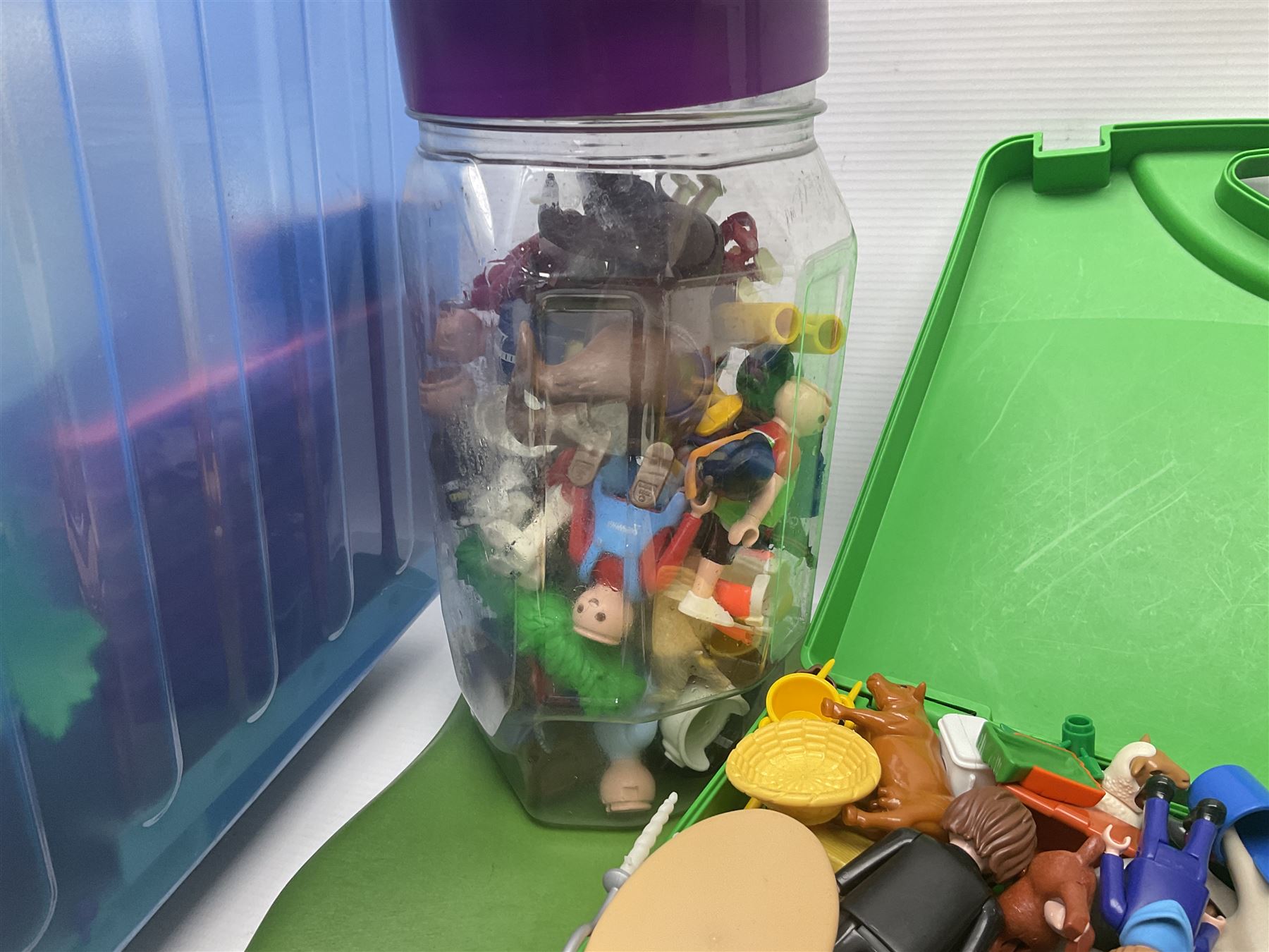 Quantity of loose Playmobil figures, playset parts and accessories, with small amount of Britains Ltd figures etc, in two boxes 