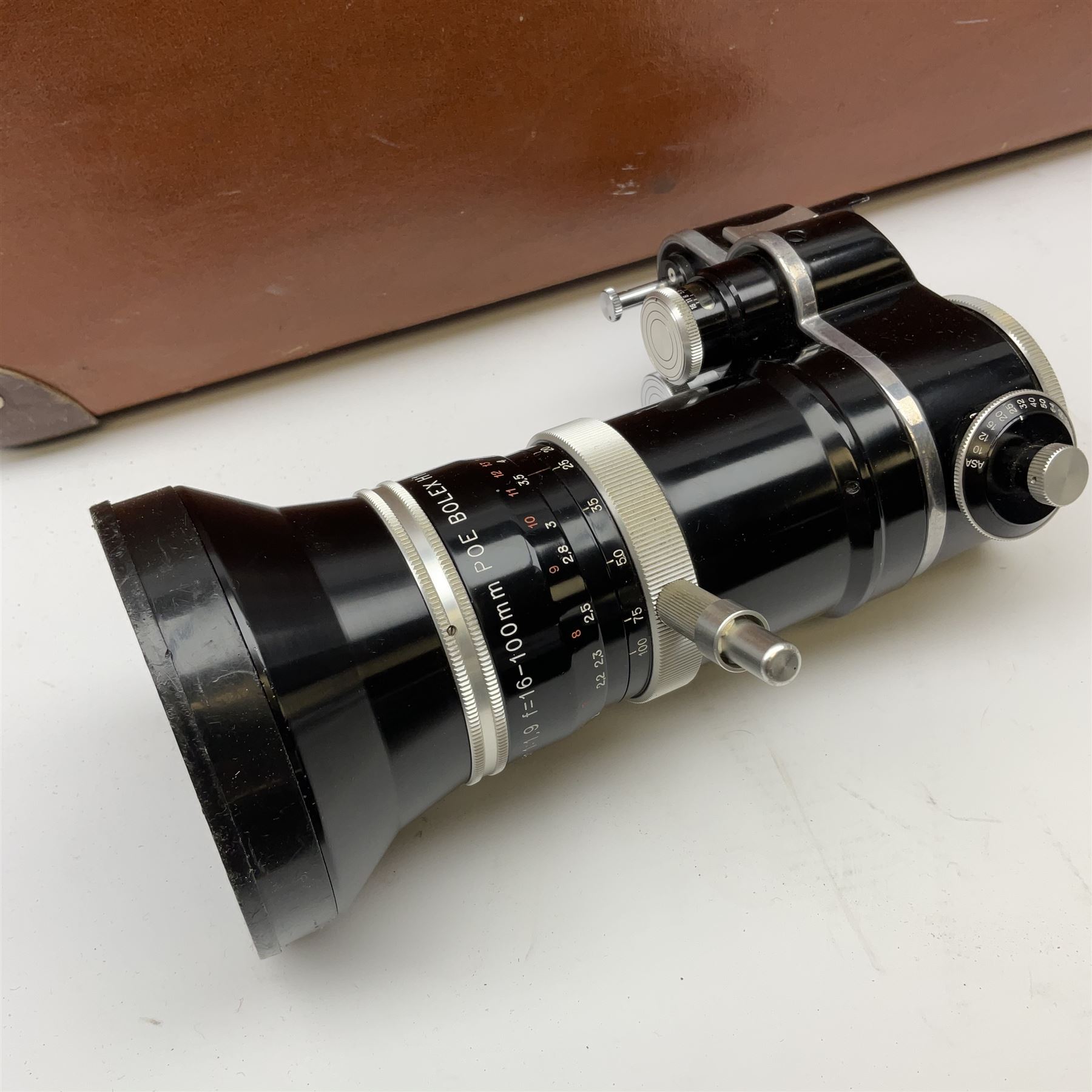 Paillard Bolex H16 Reflex 16mm cine camera with handgrip and turret for interchangeable lenses, KERN Vario-Switar 1:1,9 f=16-100mm POE BOLEX H16RX lens, KERN Switar 1:1,4 f=25mm H16 RX lens, KERN Switar 1:1,9 f=75mm lens, KERN Switar 1:1,6 f=10mm H16 RX lens