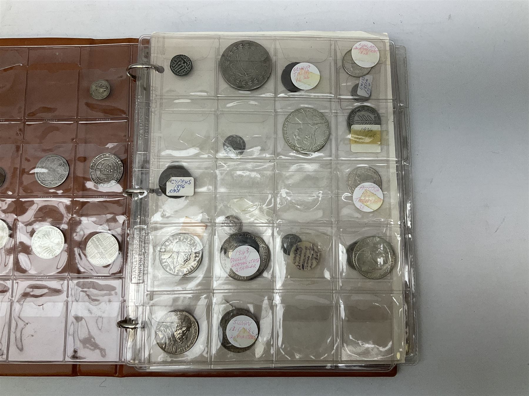 World coins and related items, including Maria Theresa restrike thaler, German silver five deutschmark coins, Sudan 20 piastres, Netherlands 1848 1/2 guilder, United States of America 1964 half dollar etc, small number of fantasy/replica coins etc, housed in a ring binder album 