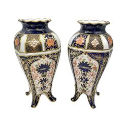 Pair of early 20th century Royal Crown Derby Imari 1128 pattern vases, of tapering straight sided form with waisted neck and frilled rim, upon four splayed feet, with printed and painted marks beneath including illustration date codes for 1911 and 1920, H17cm