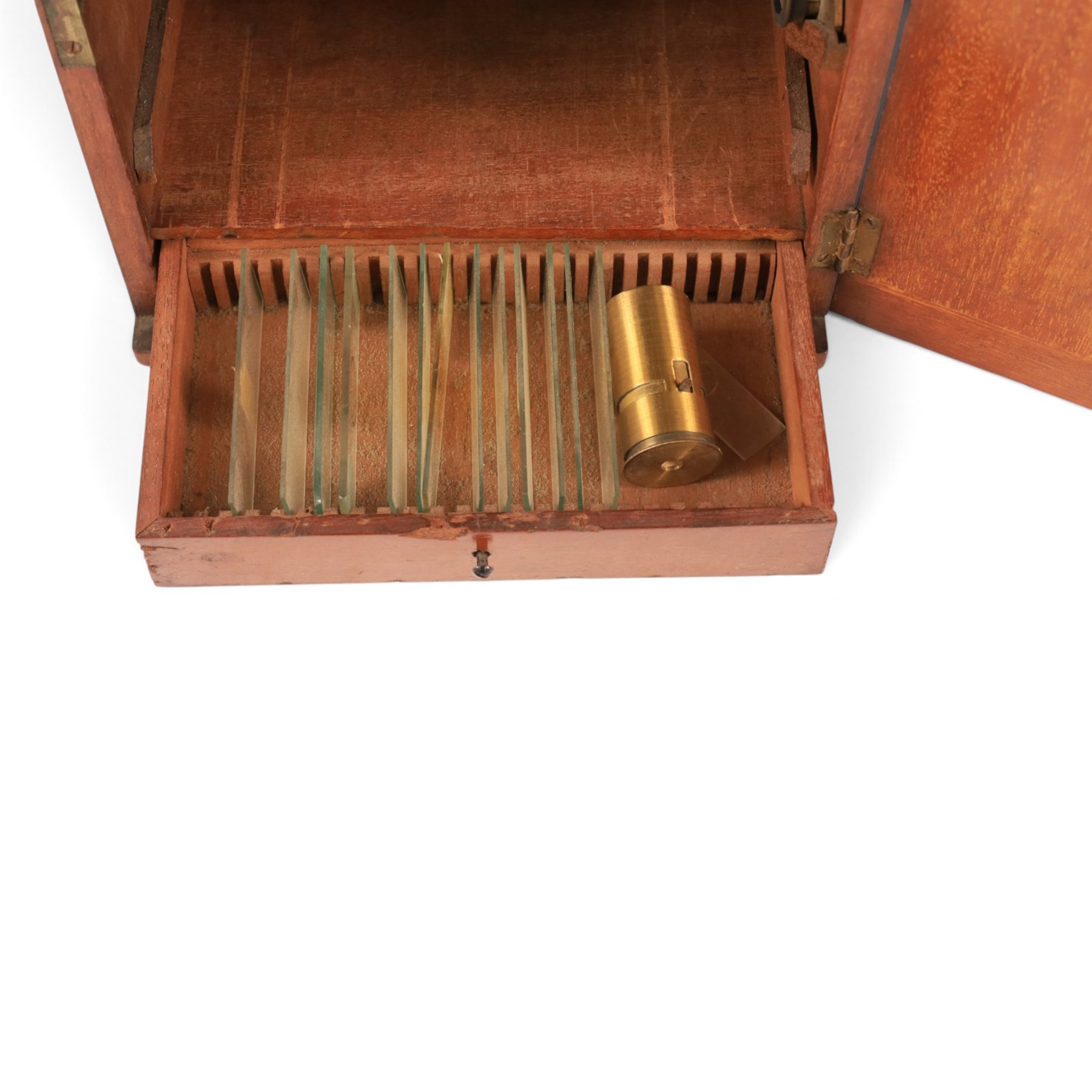 Early 20th century brass microscope, with spare lenses and a small collection of prepared slides, within wooden carry case
