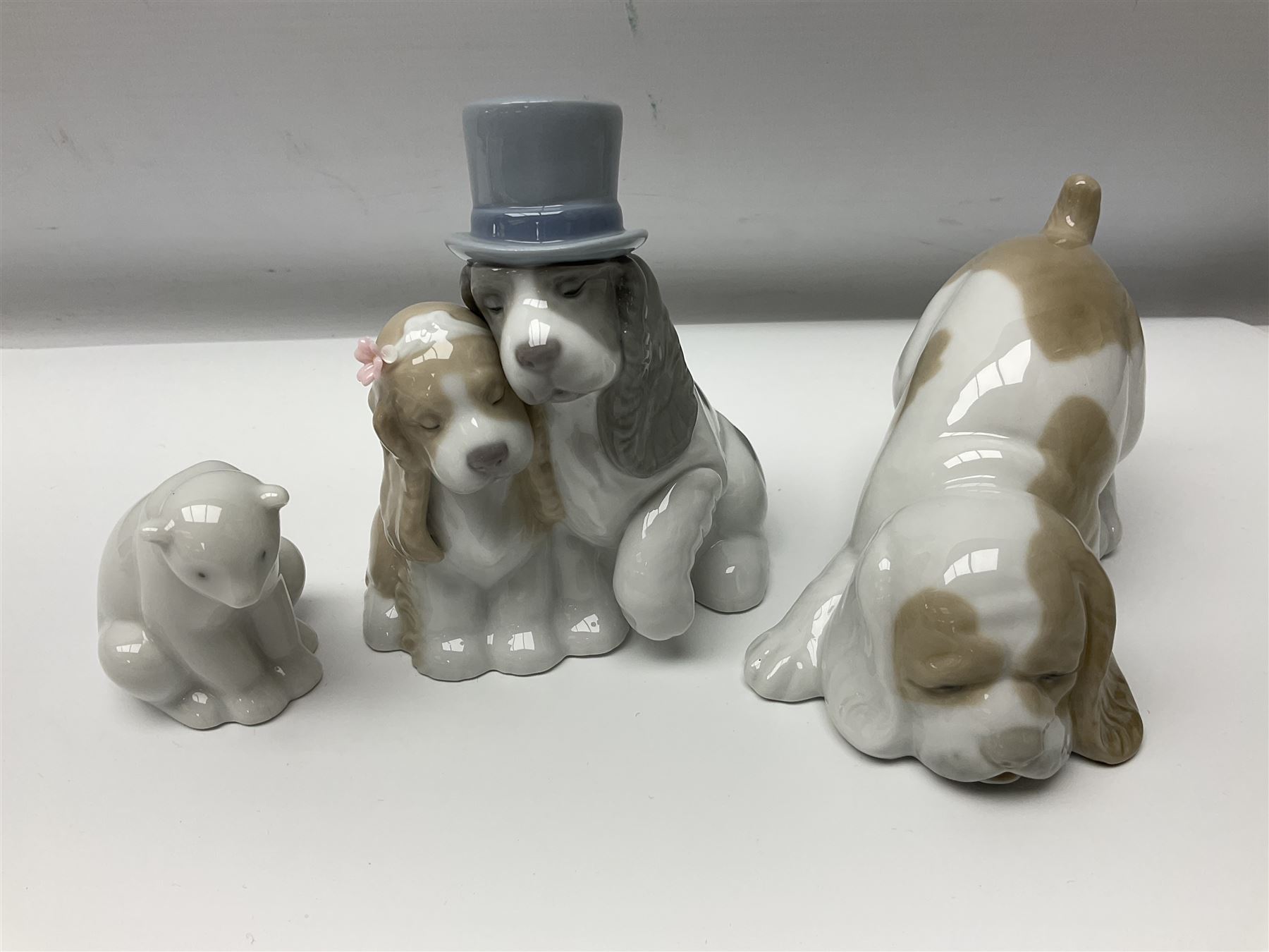 Ten Nao figures, to include three Cheeky Cherubs, Cat, Dog bride and groom etc