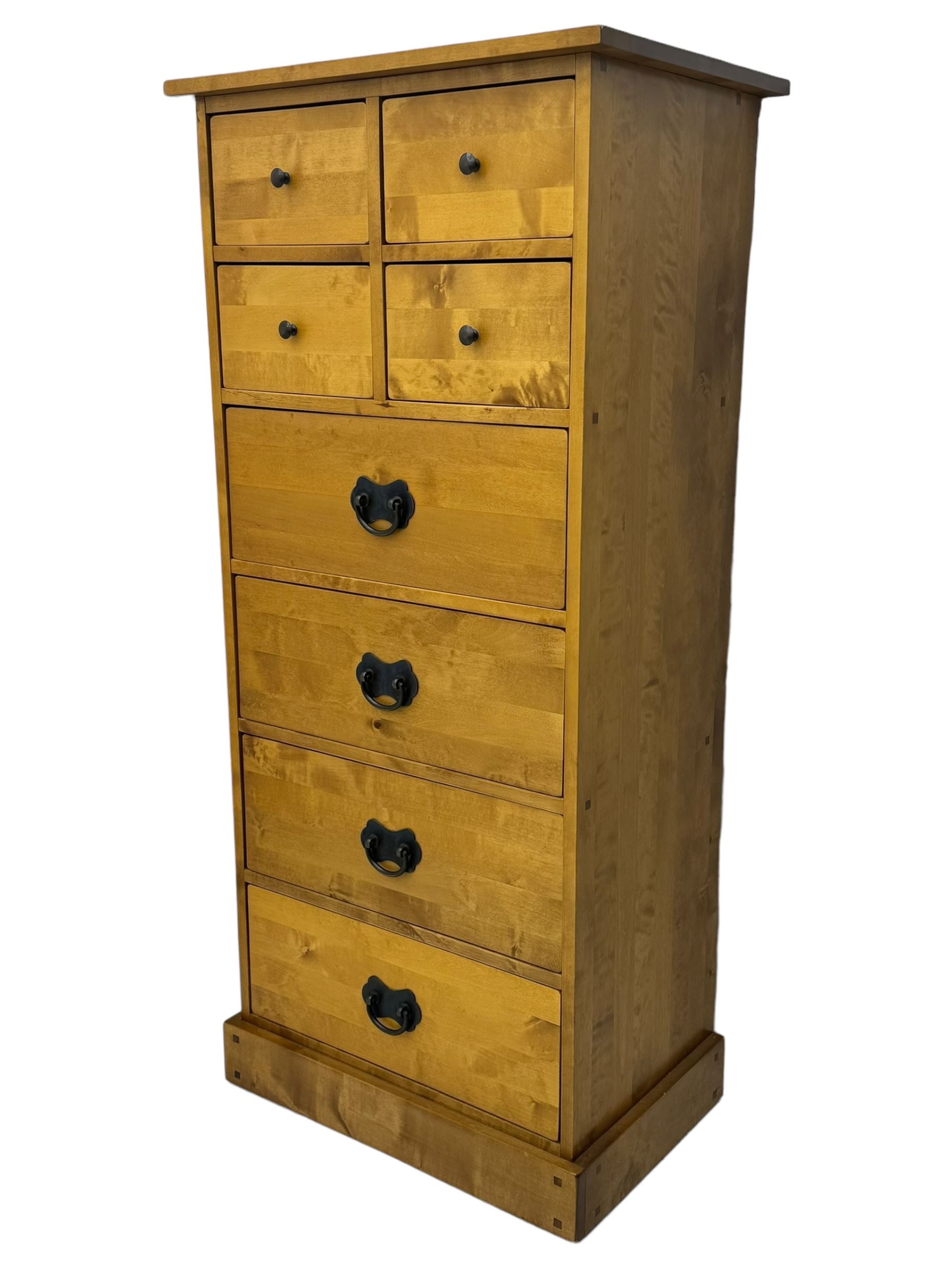 Laura Ashley - contemporary oak tall chest of drawers from the Garrat range, honeycomb rectangular top featuring central groove, over four small drawers with brass knob pulls and four long drawers with drop handles, on plinth base