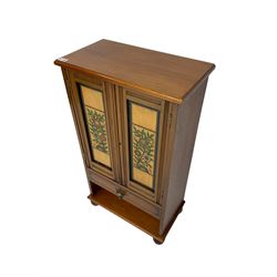 19th century and later walnut cabinet, enclosed by two doors with pained and carved floral decoration, fitted with drawer and shelf to base