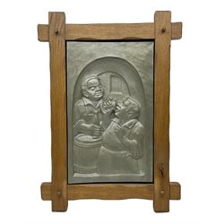 Late 20th century German pewter plaque, of rectangular form depicting two gentlemen beside a barrel drinking from a goblet and bottle, within a thick wood frame, H63cm W45cm D3.5cm