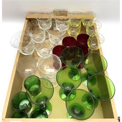 Collection of assorted drinking glasses, to include set of six with   foliate decoration to bowls, set of six green glass examples with knopped stems, commemorative Sir Winston Churchill example, etc., in one box 