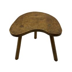 'Mouseman' circa. 1930s/40s adzed oak kidney shaped table, on octagonal tapered supports, carved with mouse signature, by Robert Thompson of Kilburn